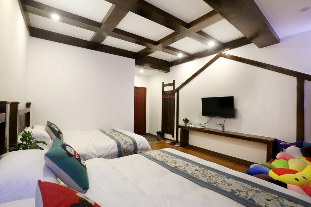 Bugu Hostel Улинъюань Экстерьер фото