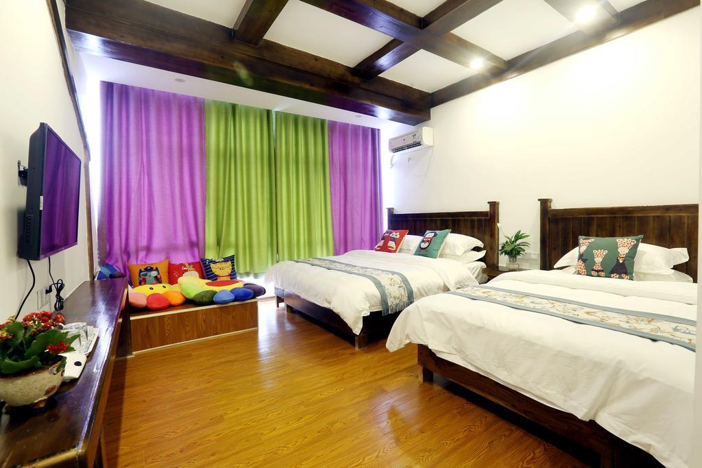 Bugu Hostel Улинъюань Экстерьер фото
